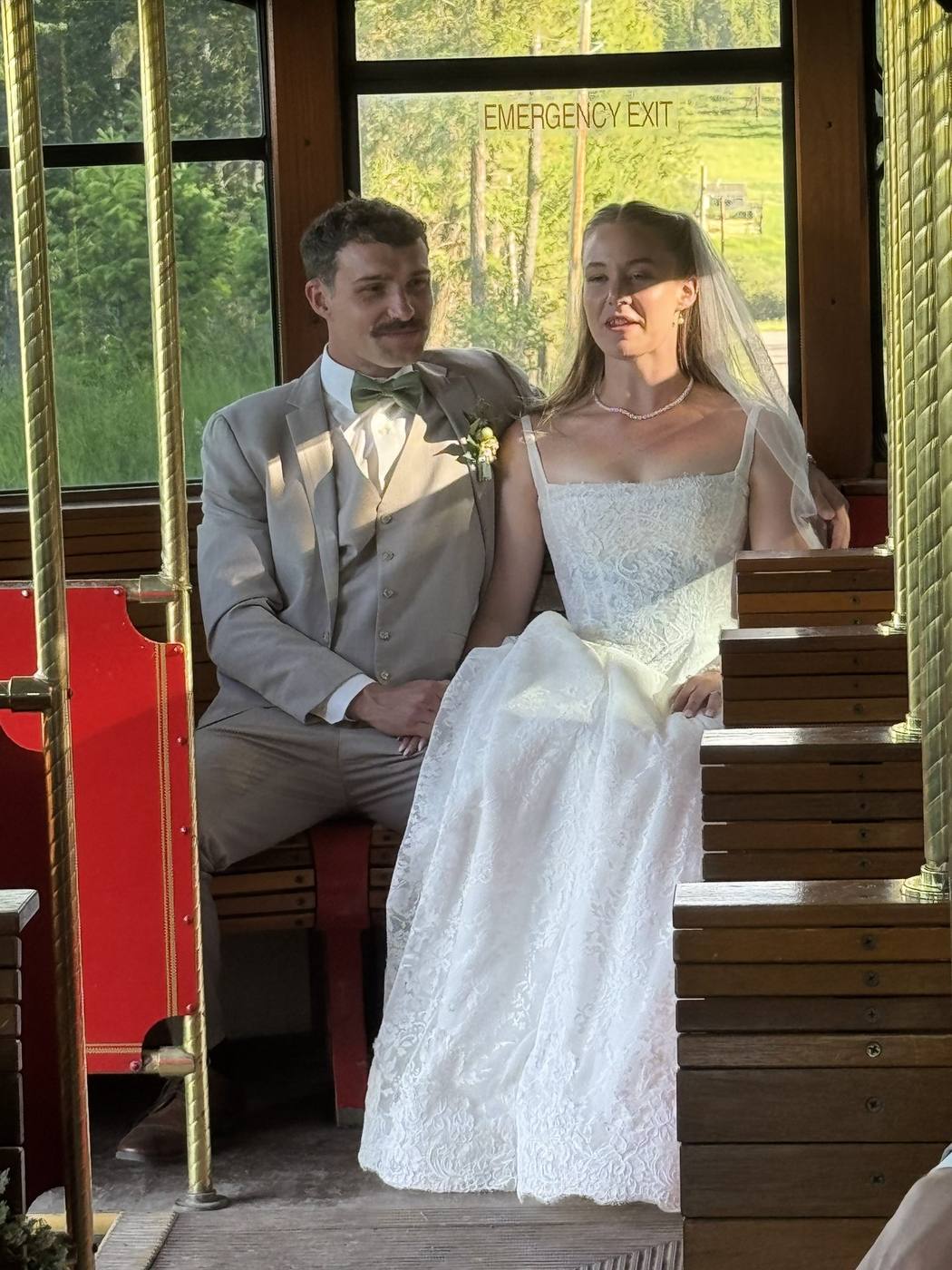 Couple sharing a quiet moment on trolley benches